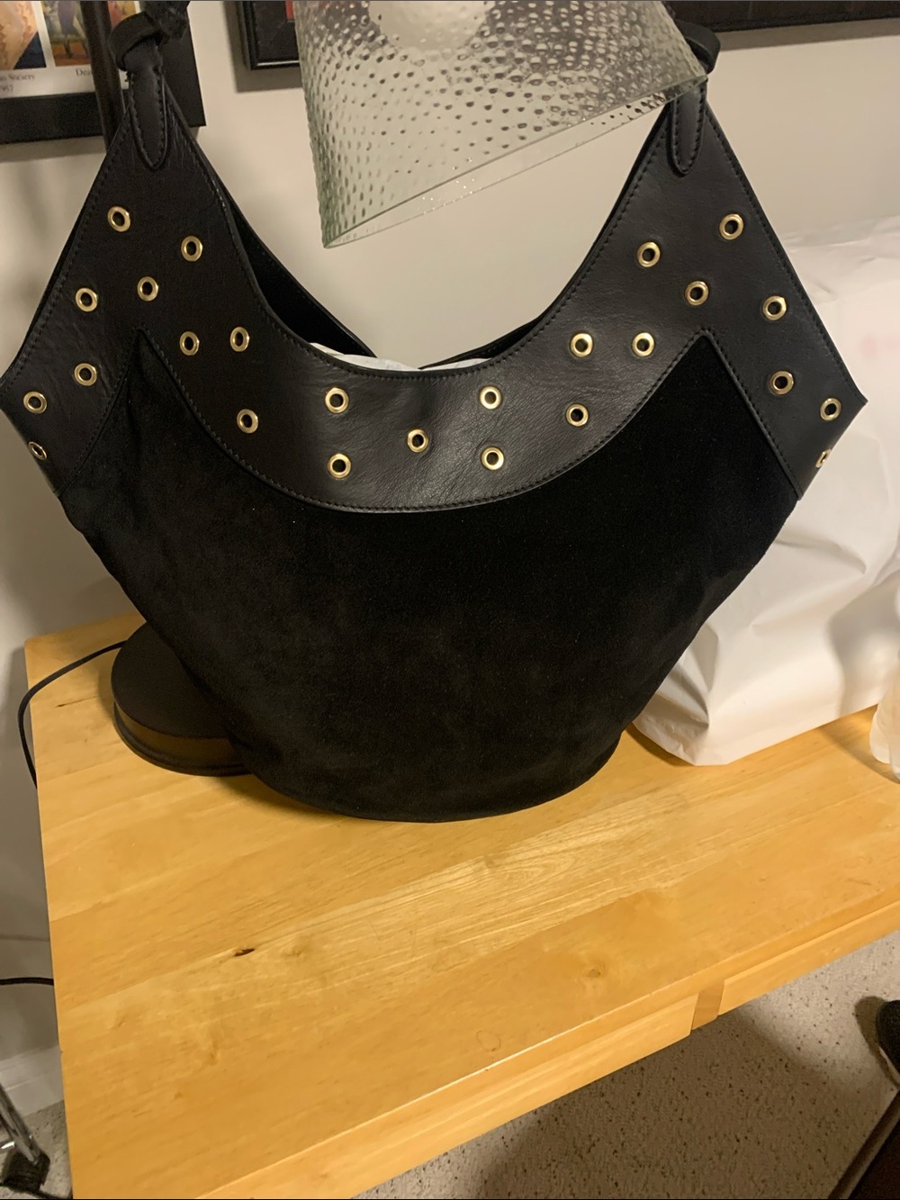 Women’s black suede shoulder bag